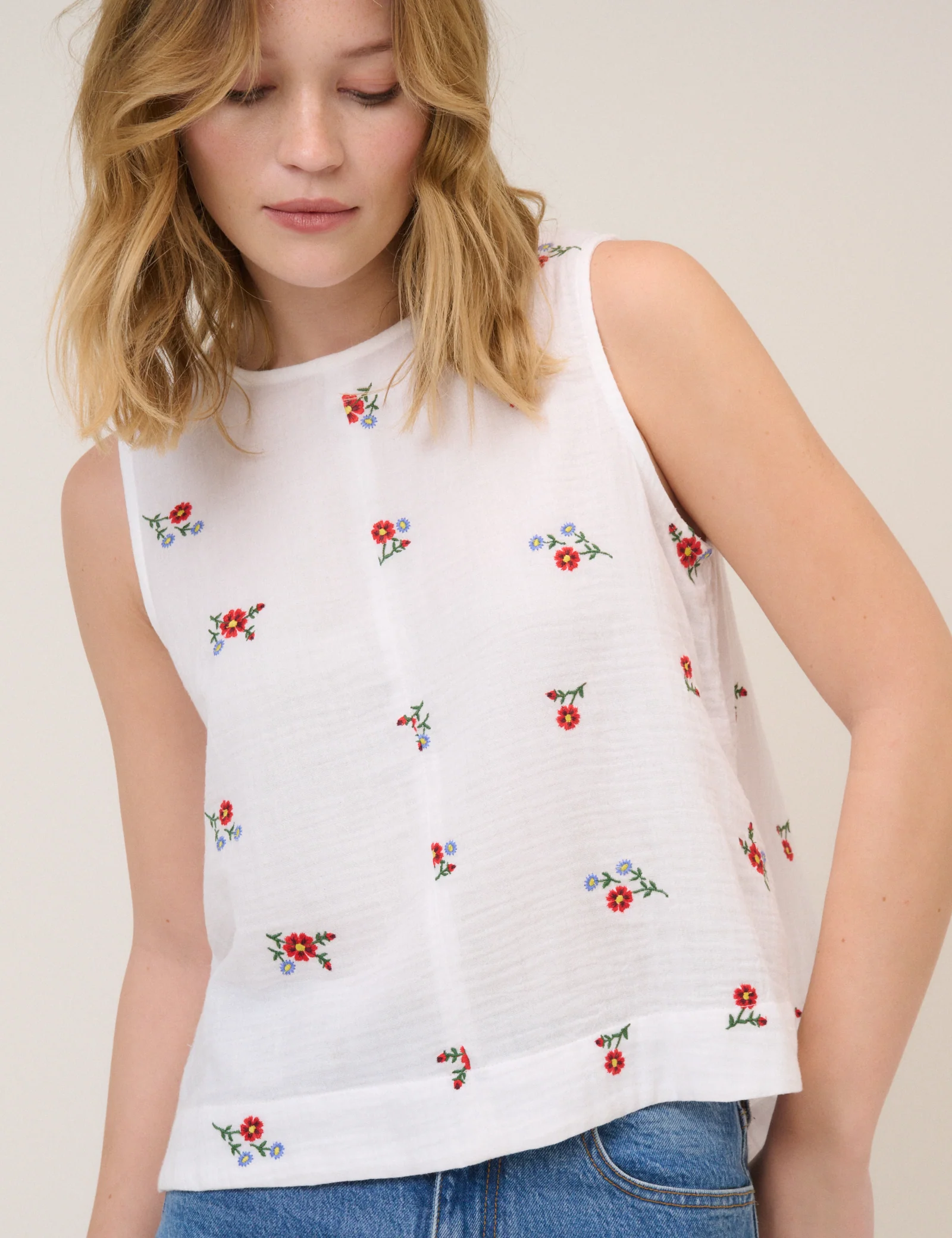 White Floral Embroidered Sleeveless Swing Top - Image 2